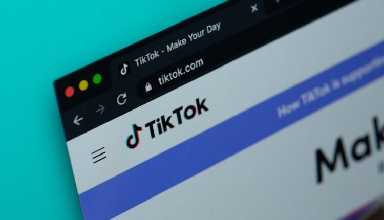 a computer screen with the word tiktok on it