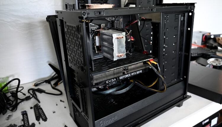 black computer tower on white table